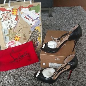 Christian Louboutin black pumps
